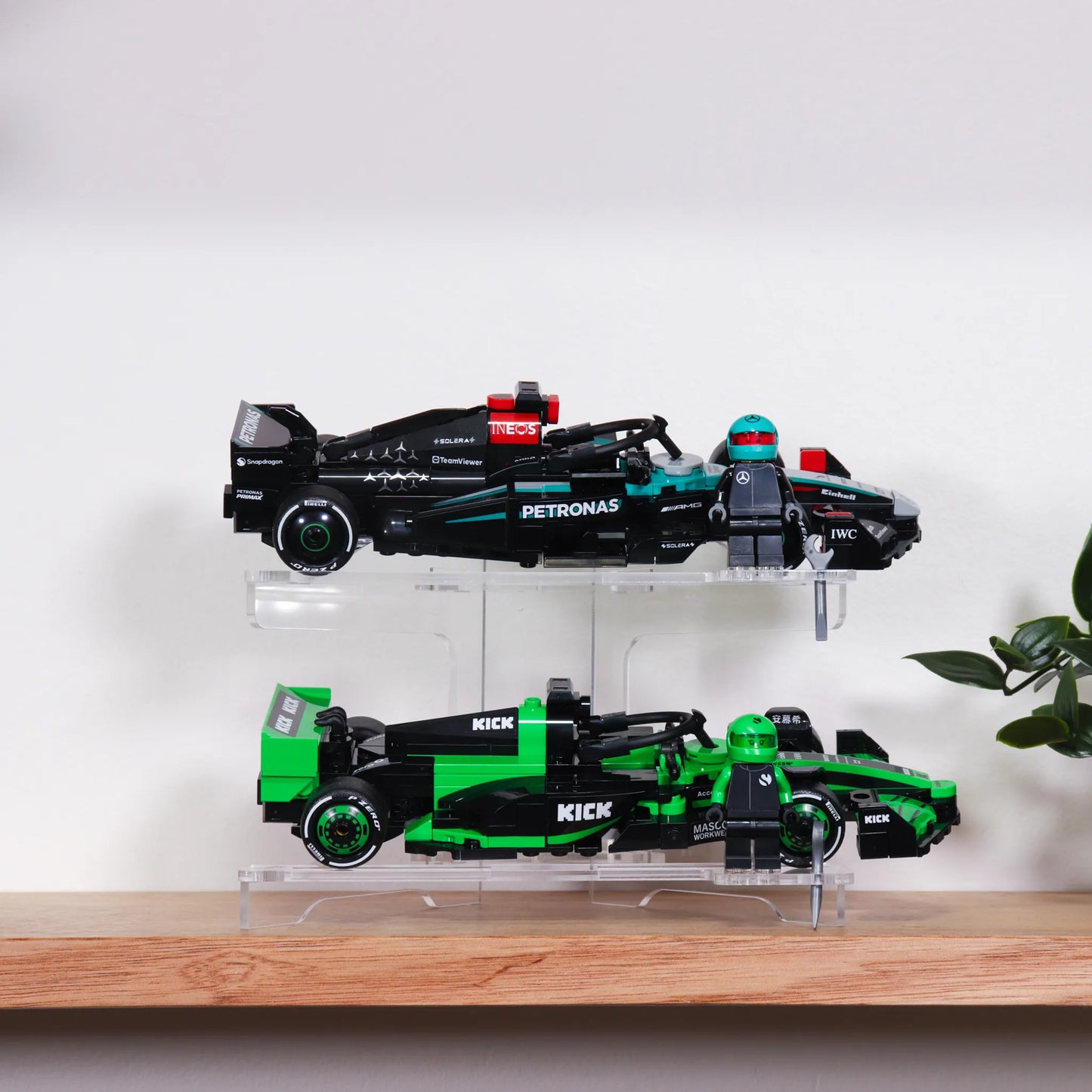 Brix Plus 2-Car acrylic display stand holding two LEGO® Speed Champions cars and minifigure drivers