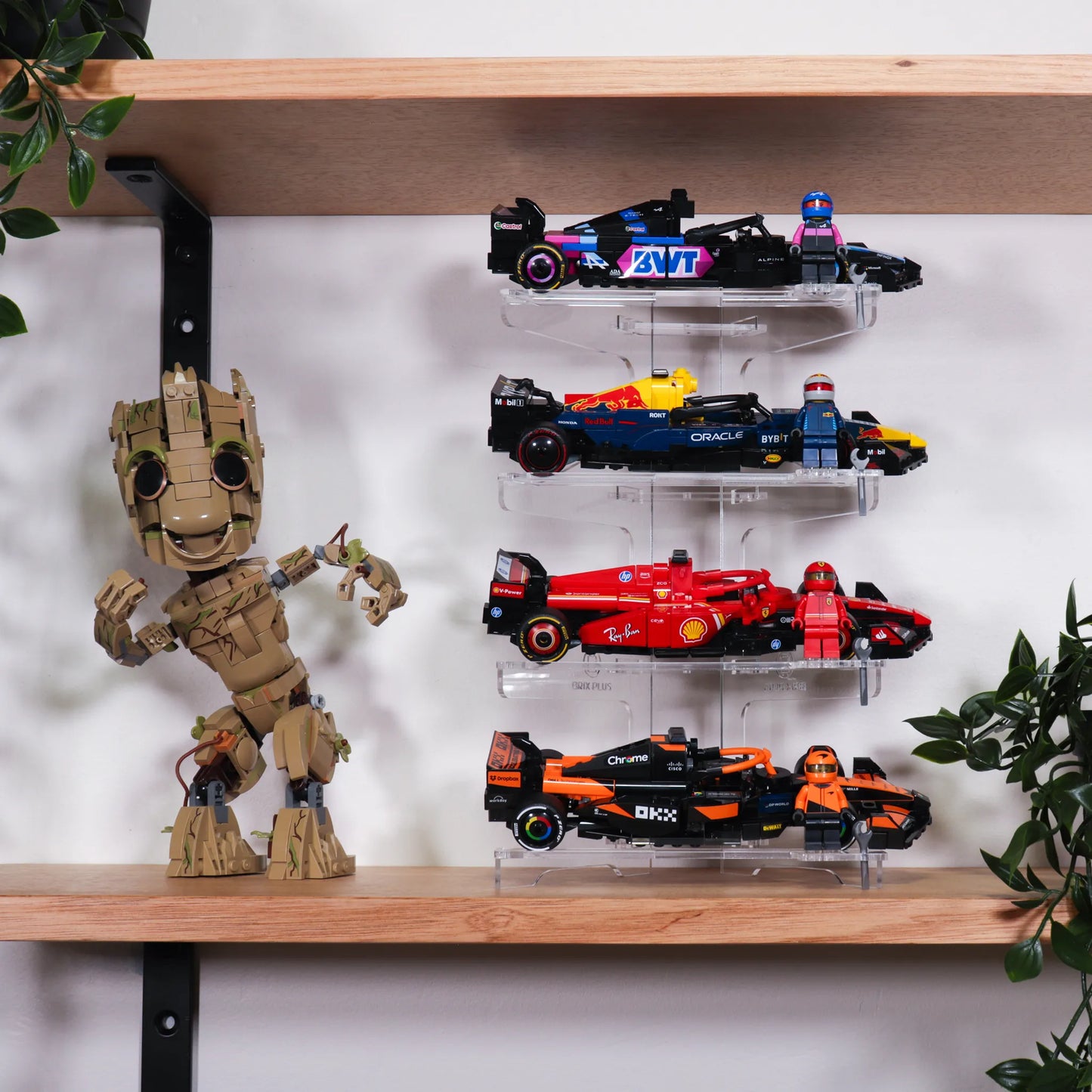 Front view of Brix Plus 4-Car display stand with LEGO® Speed Champions cars on each tier