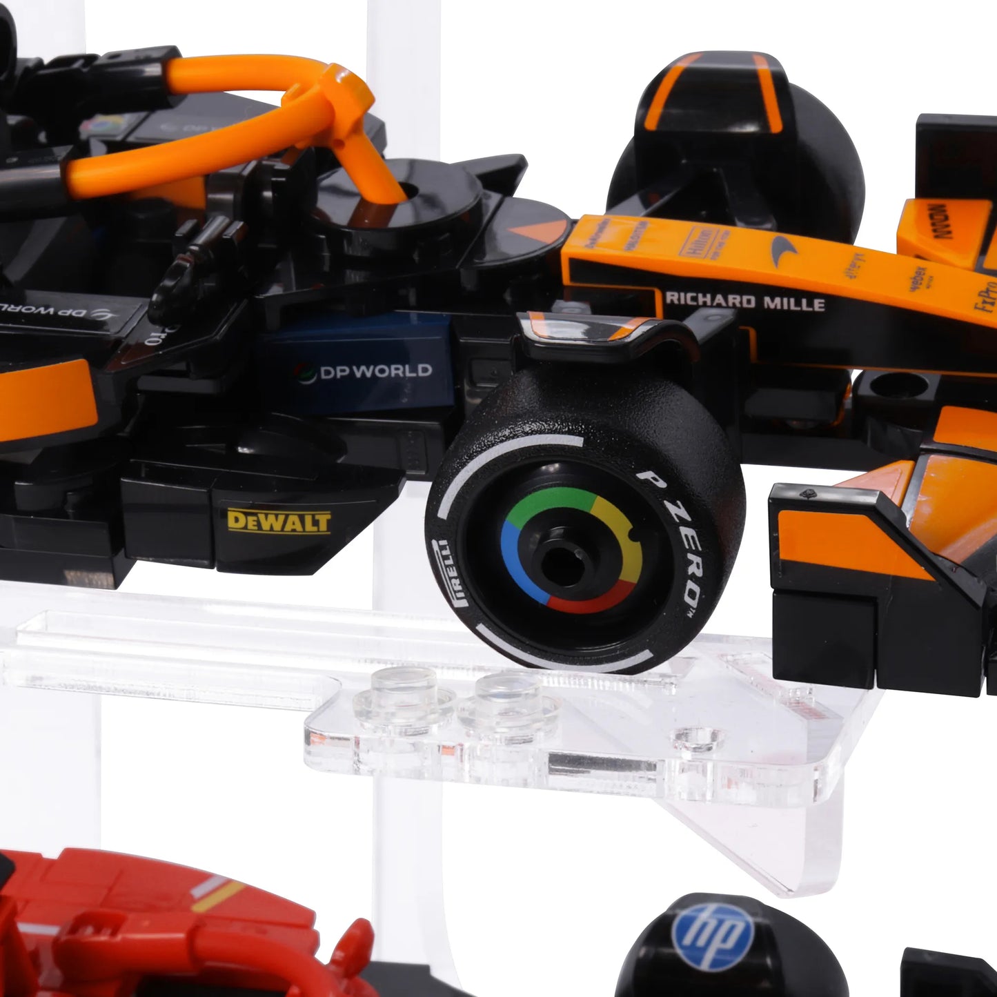 Brix Plus stand with LEGO® Speed Champions cars including McLaren F1 LM