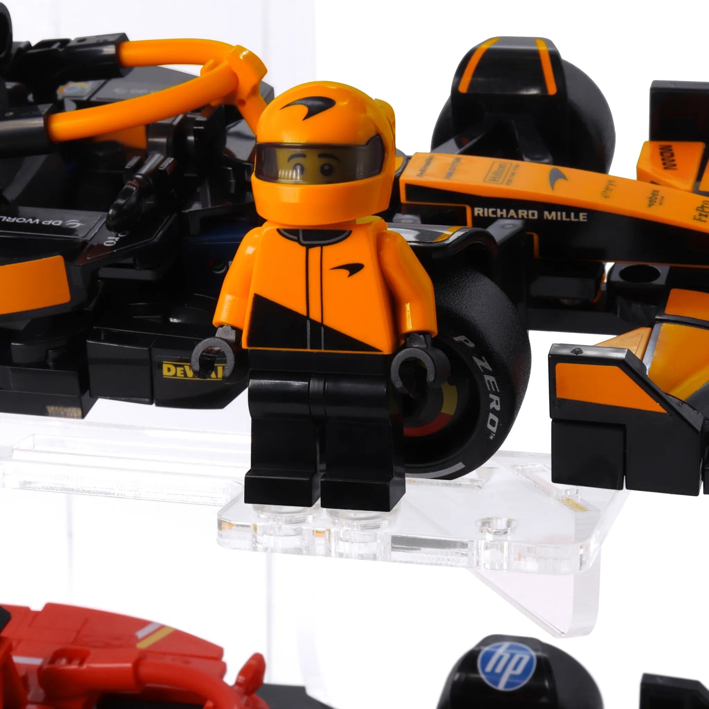 Two Brix Plus 2-Car stands shown side by side with LEGO® Speed Champions cars