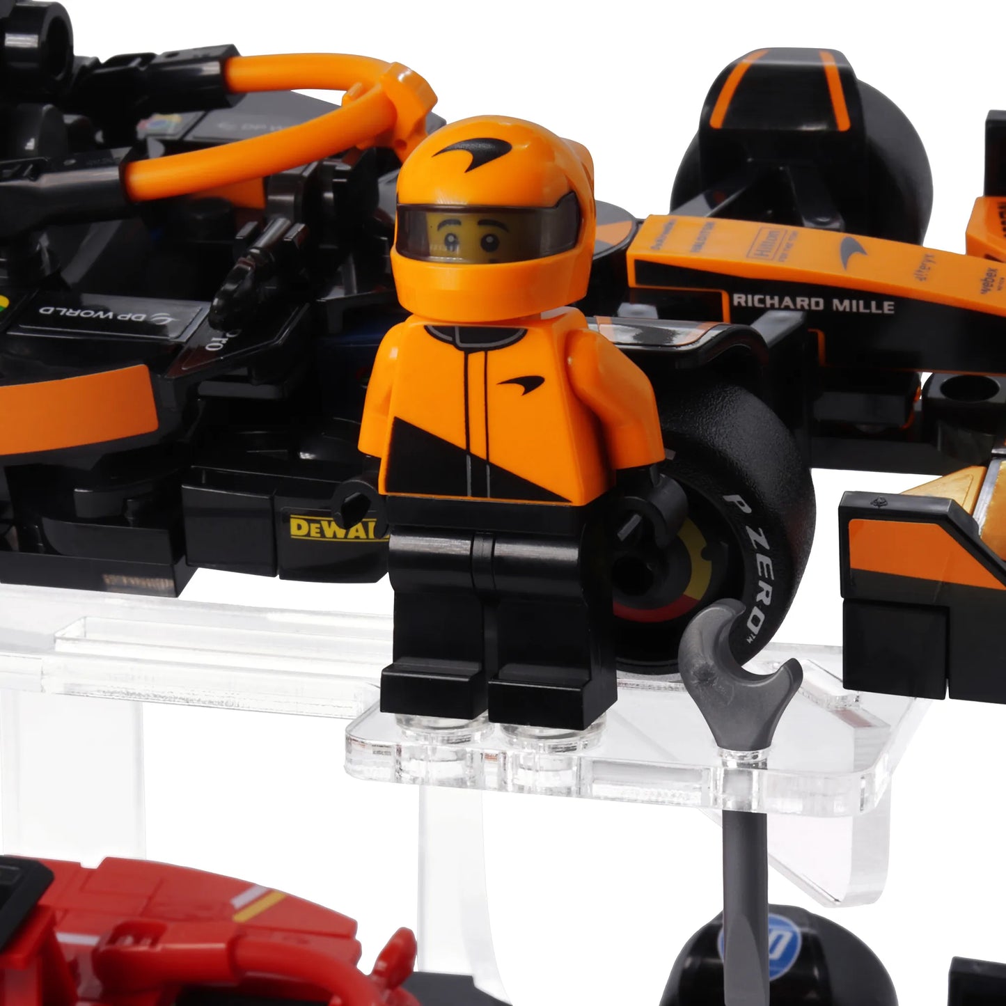Brix Plus display stand with LEGO® Speed Champions F1 cars and their minifigure drivers
